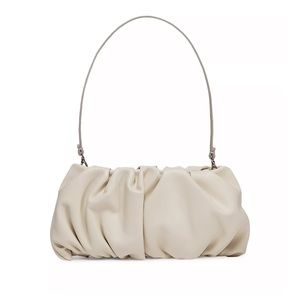 Staud Bean Small Leather Handbag. Color: cream.